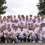 Eindejaarsgroet en groepsfoto Carinova